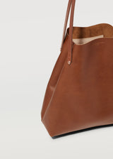 A cut view of the buttery soft Australian Made Maple Bespoke Tote, highlighting the details of the full grain leather, handle and hardware from Charlie Middleton.