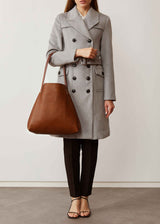 A model showcasing the buttery soft Australian Made Maple Bespoke Tote from Charlie Middleton.