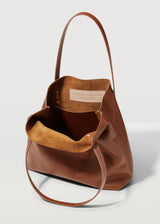 A close view of the buttery soft Australian Made Maple Bespoke Tote. Showing the inside pocket of the tote bag and Charlie Middleton logo.