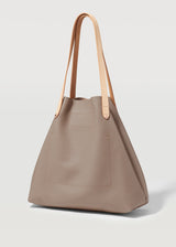 A side on view of the buttery soft Australian Made Taupe Bespoke Tote by Charlie Middleton.