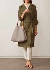 A model showcasing the buttery soft Australian Made Taupe Bespoke Tote from Charlie Middleton.