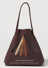A straight on view of the Burgundy Vogue Bespoke Tote, showcasing all handle options from Charlie Middleton.