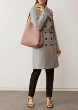 A studio style photo of the buttery soft Australian made Ballet Bespoke Tote from Charlie Middleton on a model.