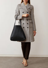 A model showcasing the buttery soft Australian Made Black Nappa Bespoke Tote from Charlie Middleton.