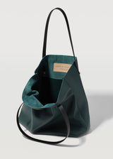 A close view of the buttery soft Australian Made Bottle Nappa Bespoke Tote. Showing the inside pocket of the tote bag and Charlie Middleton logo.