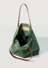 A close view of the Italian cow-suede Australian Made Forest Suede Bespoke Tote. Showing the inside pocket of the tote bag and Charlie Middleton logo.