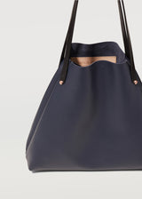 A cut view of the buttery soft Australian Made Navy Nappa Bespoke Tote, highlighting the details of the full grain leather, handle and hardware from Charlie Middleton.